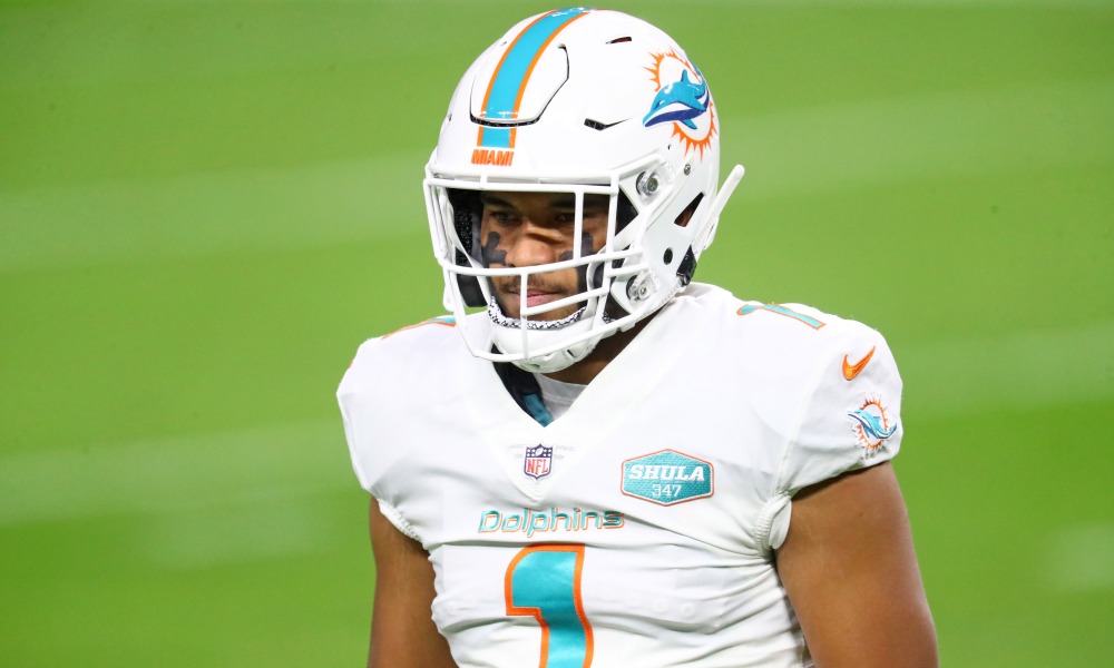 Tua Tagovailoa (#1) on the field for the Dolphins in 2021 regular season game