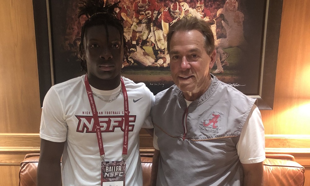 Alvin Henderson with nick saban after amp at Aabama