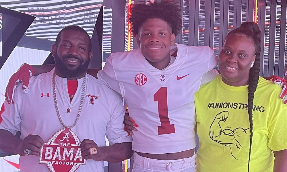 Anquon Fegans and his parents during visit to alabama