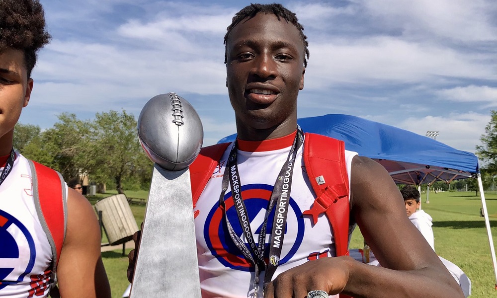 Bai Jobe holds trophy after win 7v7 tournament