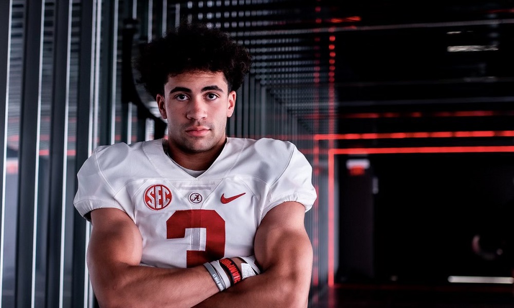 Jacobe Johnson poses in alabama uniform during official visit