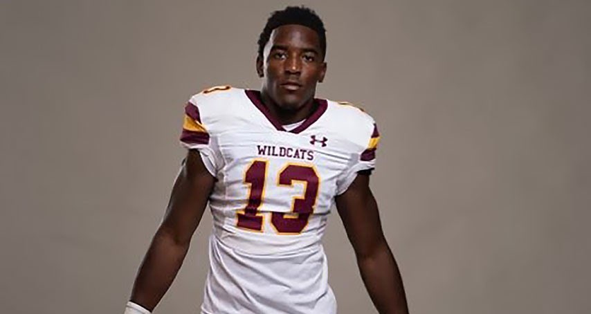 Justin Jefferson poses in pearl river uniform