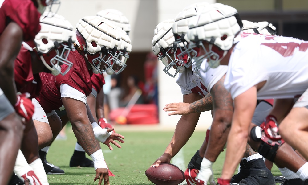 Alabama's offensive line and defensive line lined up in practice during first practice of 2022 fall camp
