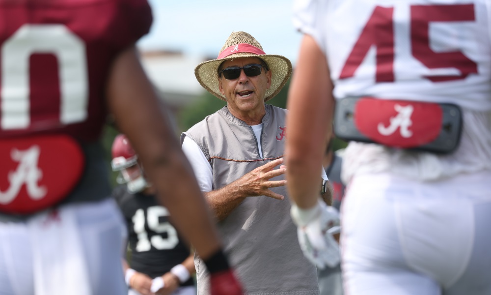 Nick Saban giving instructions to players in Alabama's 2022 Fall Camp Practice
