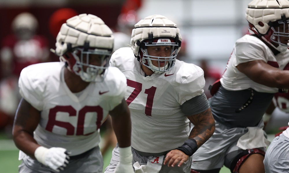Alabama offensive linemen Darrian Dalcourt (#71) and Kendall Randolph (#60) going through drills in 2022 Football Practice