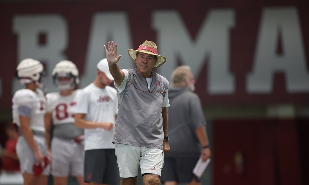 Alabama head coach Nick Saban giving signals during game week prep for Utah State