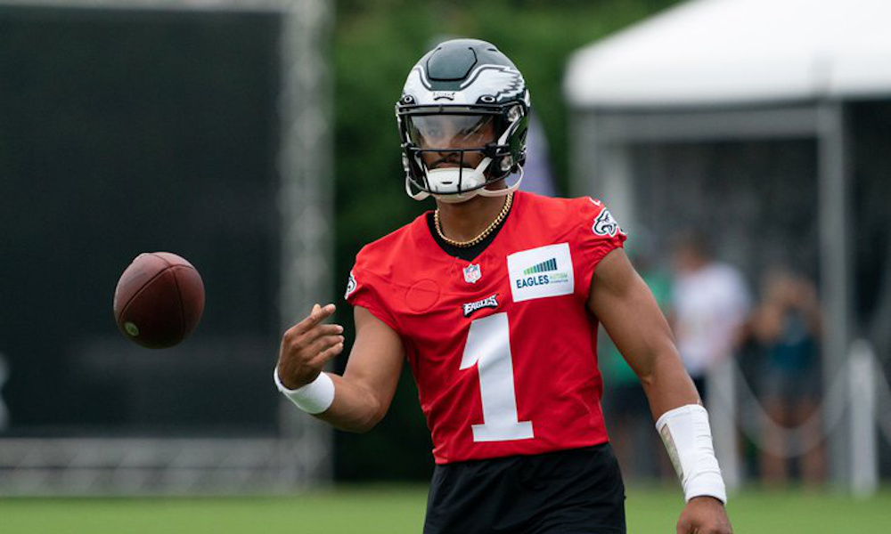 Jalen Hurts (#1) flips the ball during 2022 training camp for Philadelphia Eagles