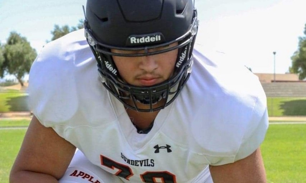 Raymond Pulido in high school football uniform