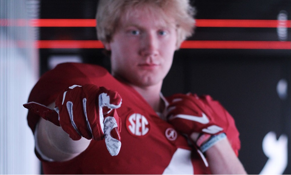 Ty lockwood points to camera in alabama uniform