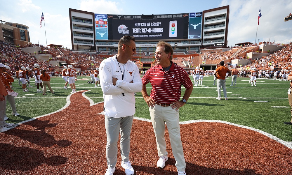 Nick Saban talks to Steve Sarkisian before Alabama-Texas matchup