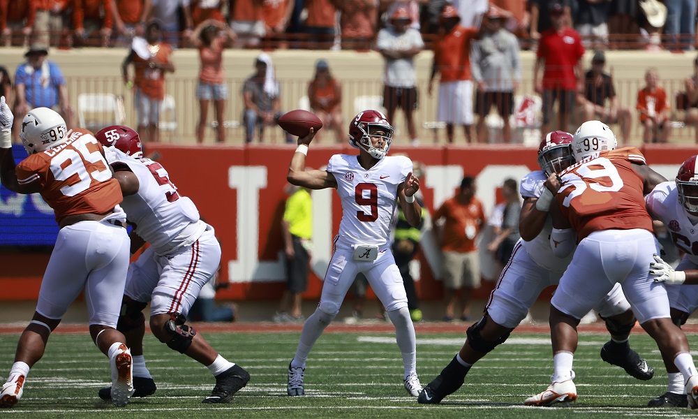 Alabama QB Bryce Young (#9) throws a pass from the pocket versus Texas