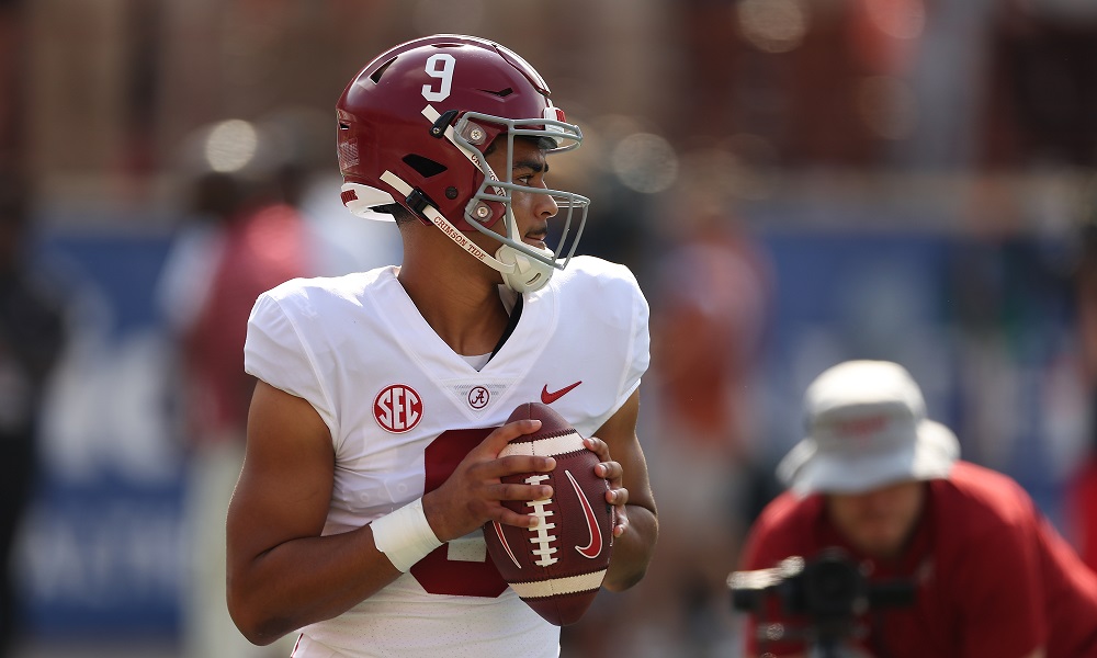 Alabama QB Bryce Young (#9) holding the ball in the pocket against Texas