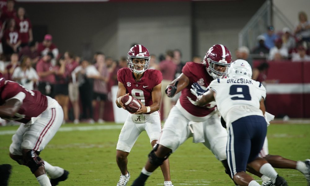 Bryce Young drops back to pass against Utah State