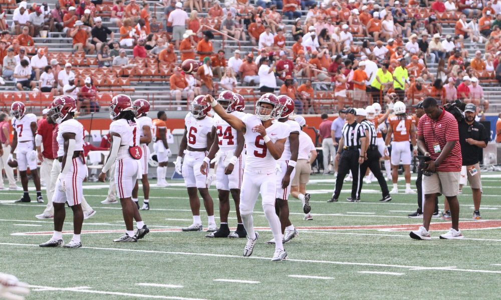 Bryce Young warms up against Texas