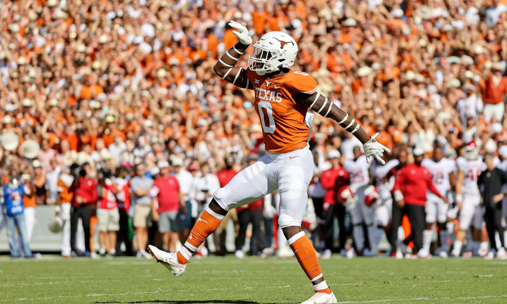 Texas LB DeMarvion Overshown (#0) records a sack versus Oklahoma in 2021 season