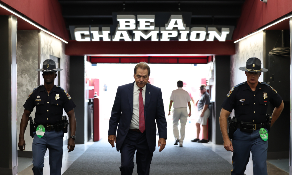 Alabama head coach Nick Saban walks through the tunnel for season opener against Utah State