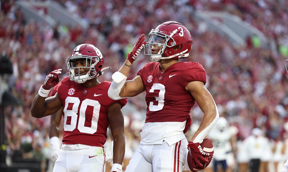 Alabama WR Jermaine Burton (#3) celebrates a touchdown versus Utah State