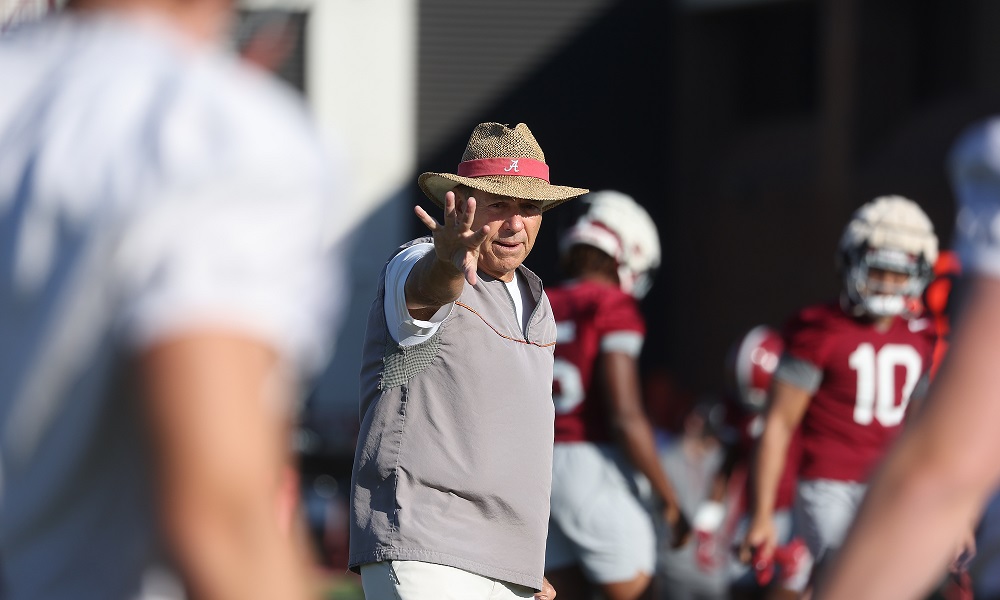 Alabama head coach Nick Saban giving signals in practice for Mississippi State game