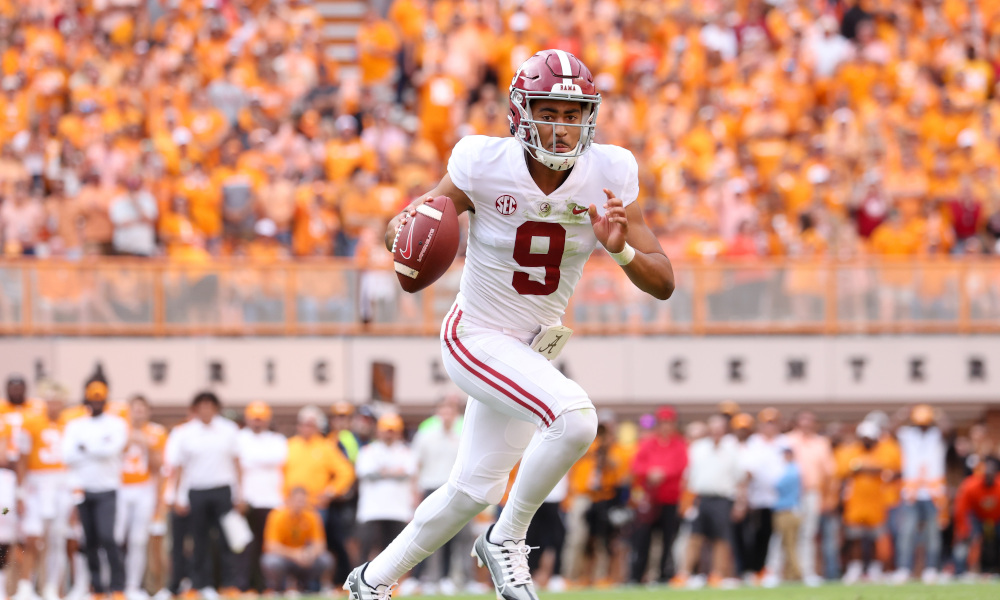 Alabama QB Bryce Young (#9) buys time to throw a TD versus Tennessee