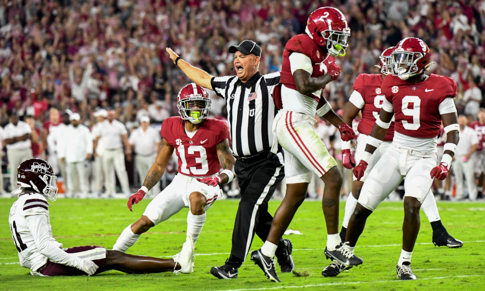 Alabama safety DeMarcco Hellams (#2) celebrates a pass breakup in matchup versus Mississippi State