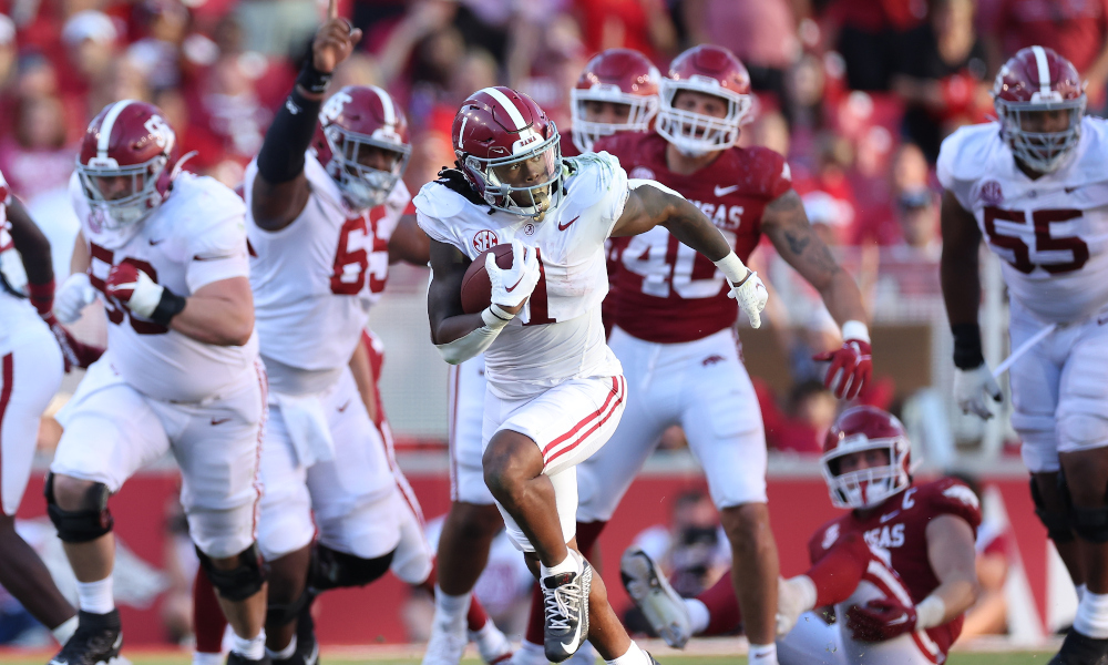 Jahmyr Gibbs (#1) runs for a long touchdown in Alabama's matchup against Arkansas