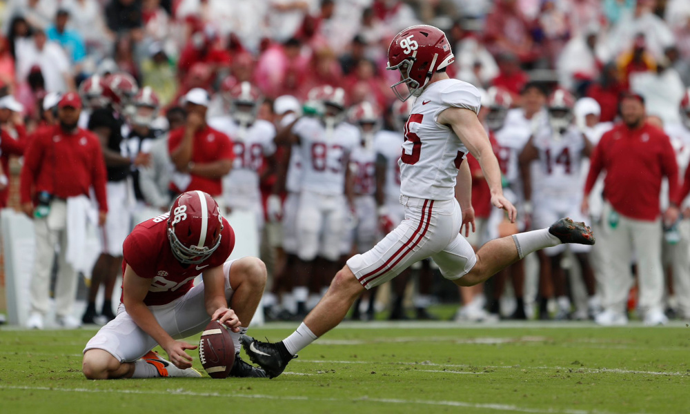 Jack Martin (#95) kicks a field goal for Alabama during 2022 spring game