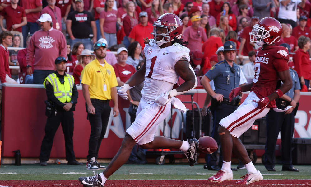 Alabama RB Jahmyr Gibbs (#1) scores a long touchdown against Arkansas