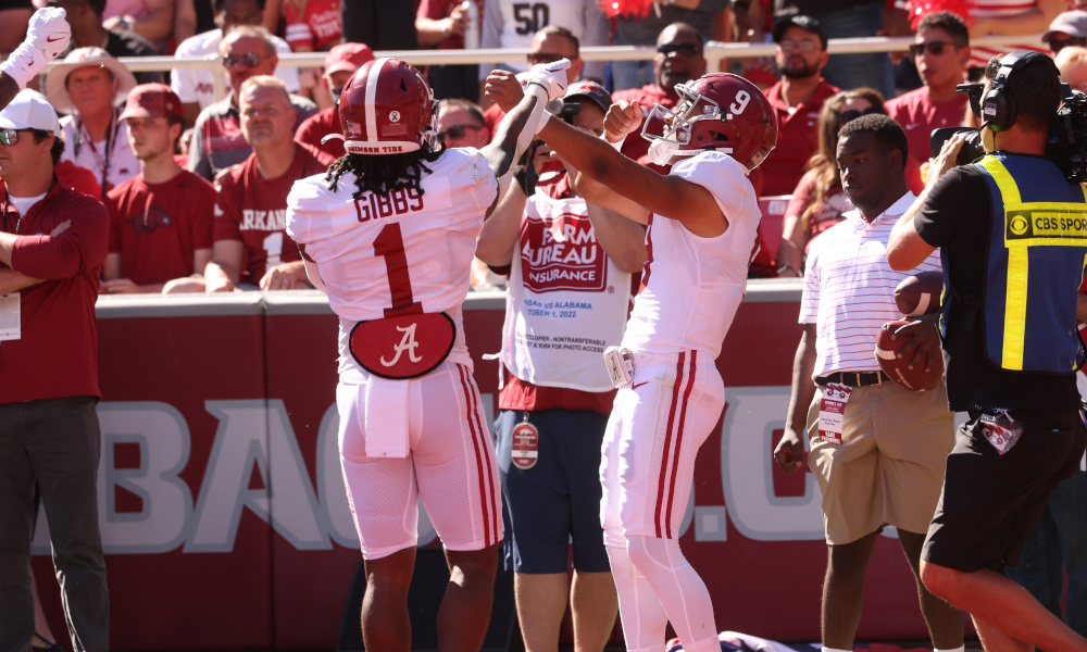 Jahmyr Gibbs (#1) and Bryce Young (#9) celebrating a touchdown for Gibbs versus Arkansas