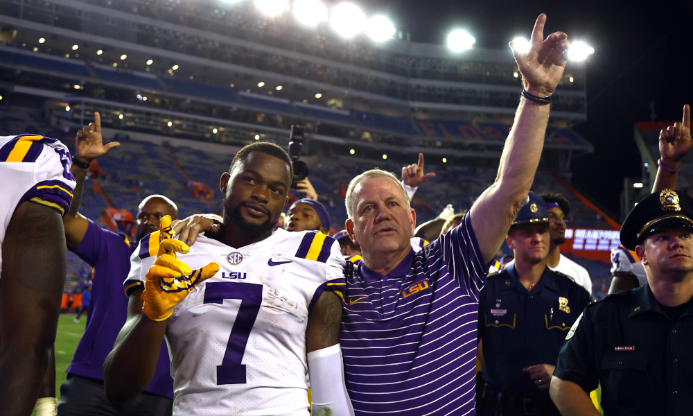 LSU head coach Brian Kelly and WR Kayshon Boutte celebrate a victory over Florida in 2022 matchup