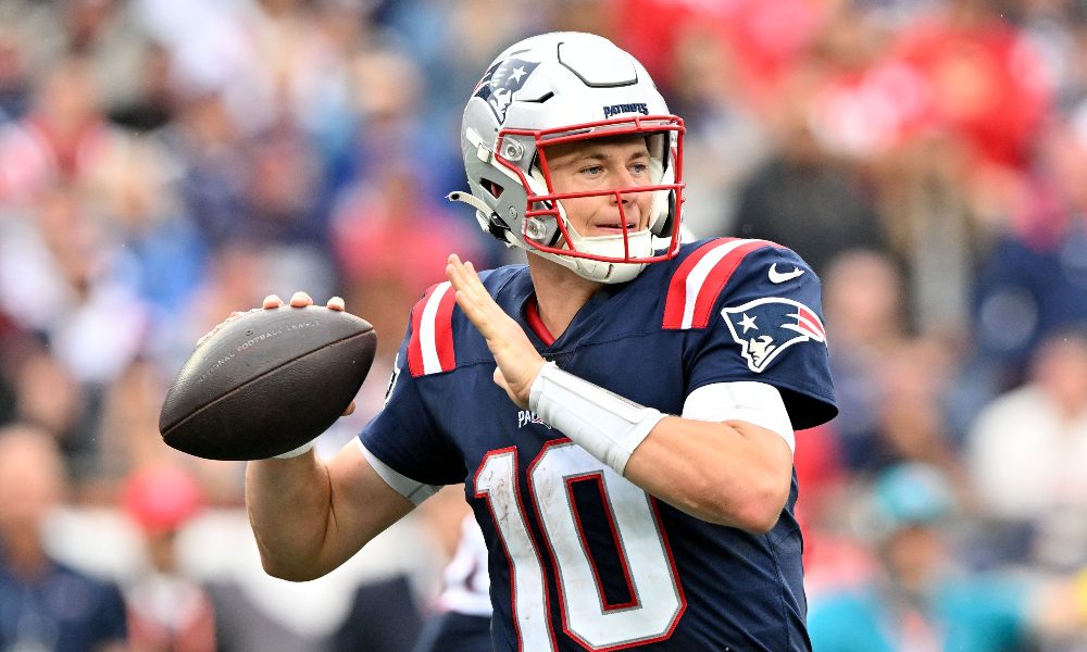 Mac Jones throws a pass for the Patriots