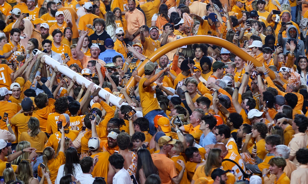 Oct 15, 2022; Knoxville, Tennessee, USA; Tennessee Volunteers fans carry the goal posts after defeating the Alabama Crimson Tide at Neyland Stadium. Mandatory Credit: Randy Sartin-USA TODAY Sports