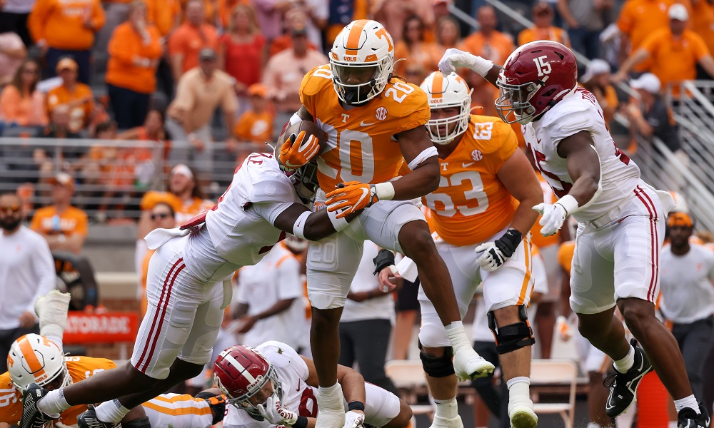 Oct 15, 2022; Knoxville, Tennessee, USA; Tennessee Volunteers running back Jaylen Wright (20) runs the ball against the Alabama Crimson Tide during the first quarter at Neyland Stadium. Mandatory Credit: Randy Sartin-USA TODAY Sports
