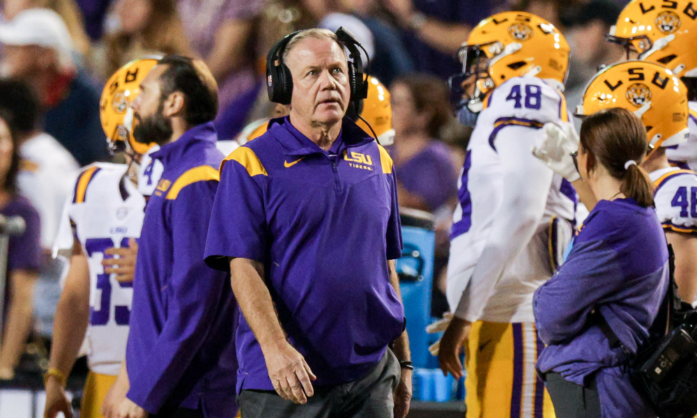 LSU head coach Brian Kelly walking down the sideline during 2022 matchup against Alabama