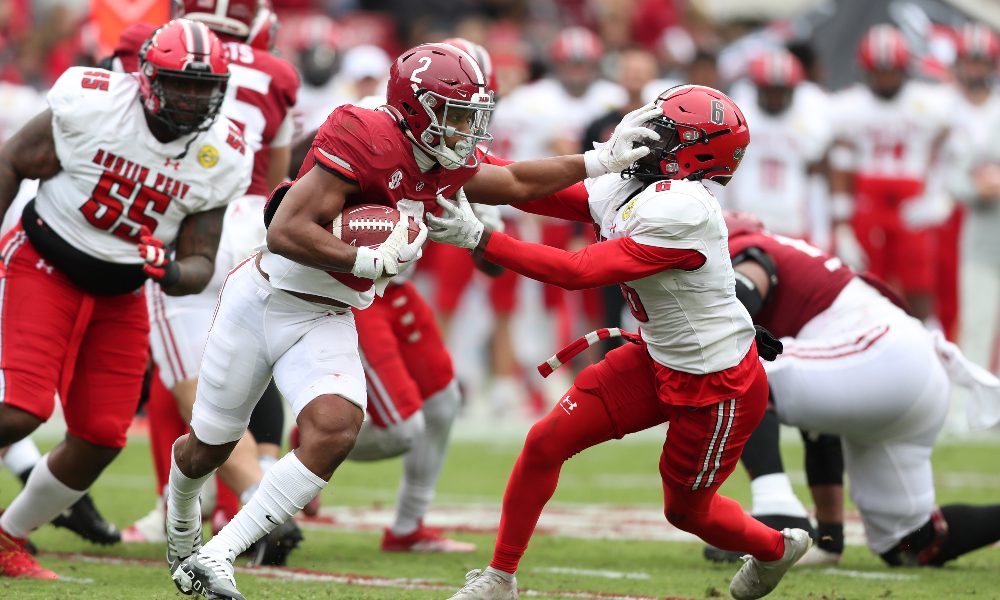 Jase McClellan stiff arms Austin Peay defender