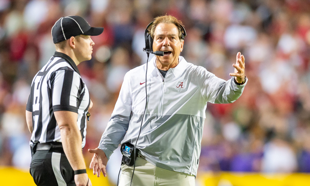Alabama head coach Nick Saban talking to an official in 2022 game against LSU