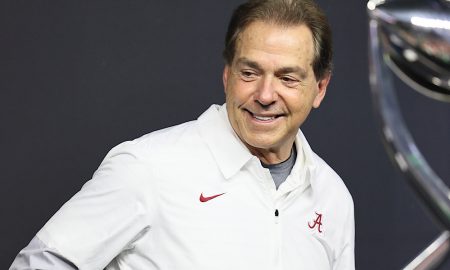 Dec 31, 2021; Arlington, Texas, USA; Alabama Crimson Tide head coach Nick Saban smiles while on the trophy podium after a victory against the Cincinnati Bearcats during the 2021 Cotton Bowl college football CFP national semifinal game at AT&T Stadium. Mandatory Credit: Matthew Emmons-USA TODAY Sports