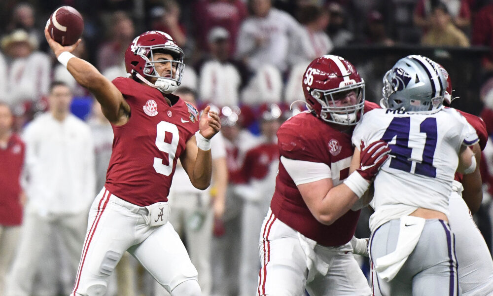 Bryce Young throws a pass against Kansas State