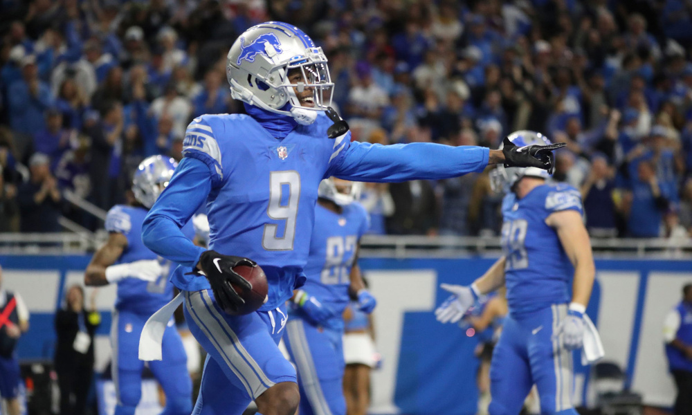 Lions' WR Jameson Williams (#9) celebrates first career NFL touchdown for the Detroit Lions in Sunday's game versus the Minnesota Vikings