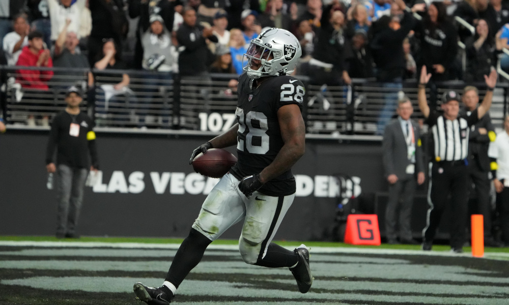 Josh Jacobs going in reverse in the Las Vegas Raiders' 38-10 loss