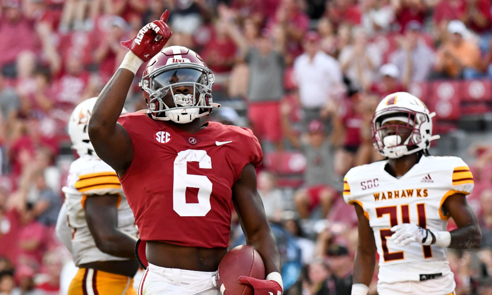 Alabama running back Trey Sanders (#6) celebrates a rushing touchdown in 2022 matchup against Louisiana-Monroe at Bryant-Denny Stadium.