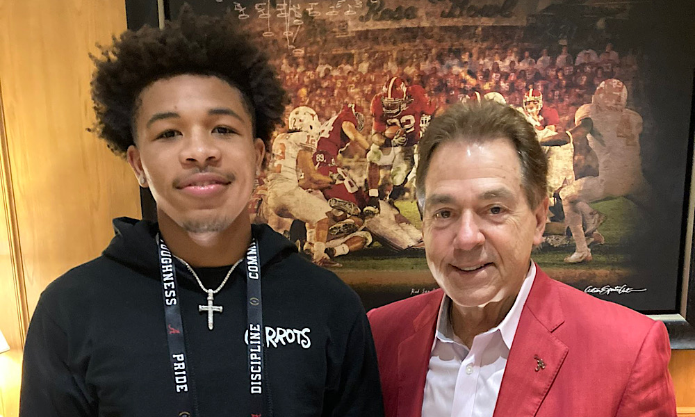 Jakob Gude with Nick Saban