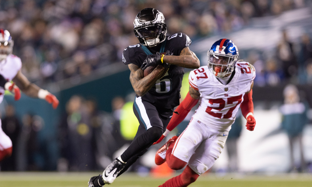 Eagles' wide receiver DeVonta Smith (#6) runs with the ball after a catch against the New York Giants in Sunday's matchup.