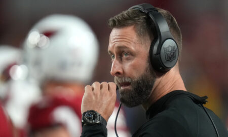 Former Cardinals head coach Kliff Kingsbury coaching on the sideline during 2022 matchup against Tampa Bay.