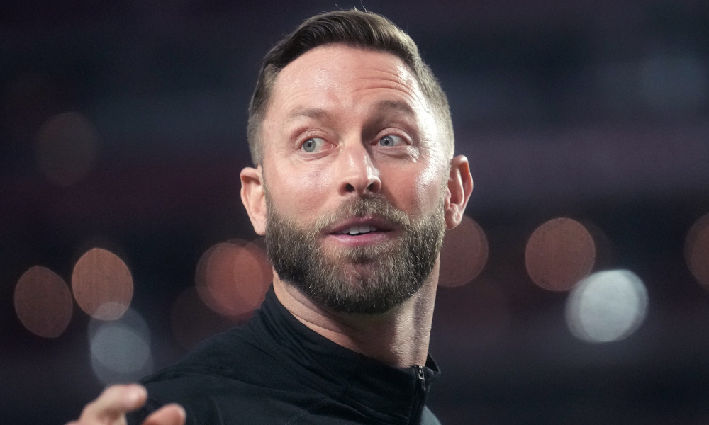Former Arizona Cardinals head coach Kliff Kingsbury takes the field before 2022 matchup against the Tampa Bay Buccaneers.