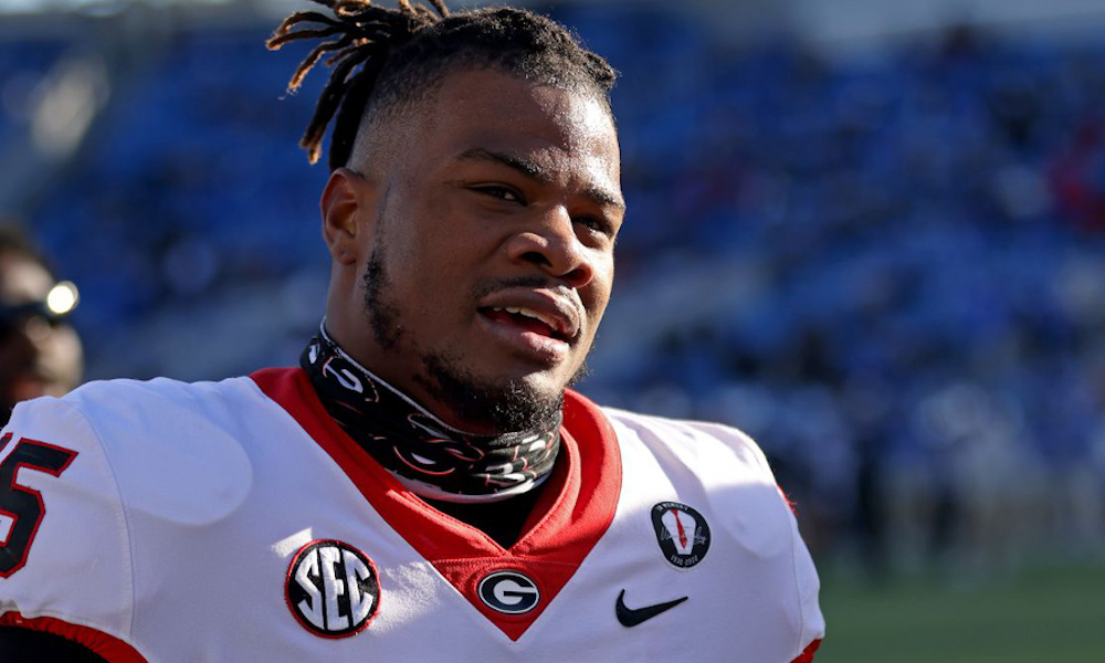 Former UGA linebacker Trezmen Marshall warms up before 2022 matchup against Kentucky