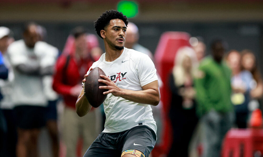 Bryce Young drops back to pass at Alabama's Pro Day