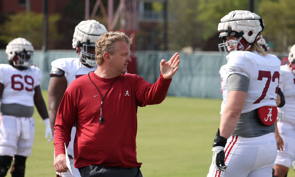 Alabama OL coach Eric Wolford working with the Crimson Tide's offensive line in spring practice.