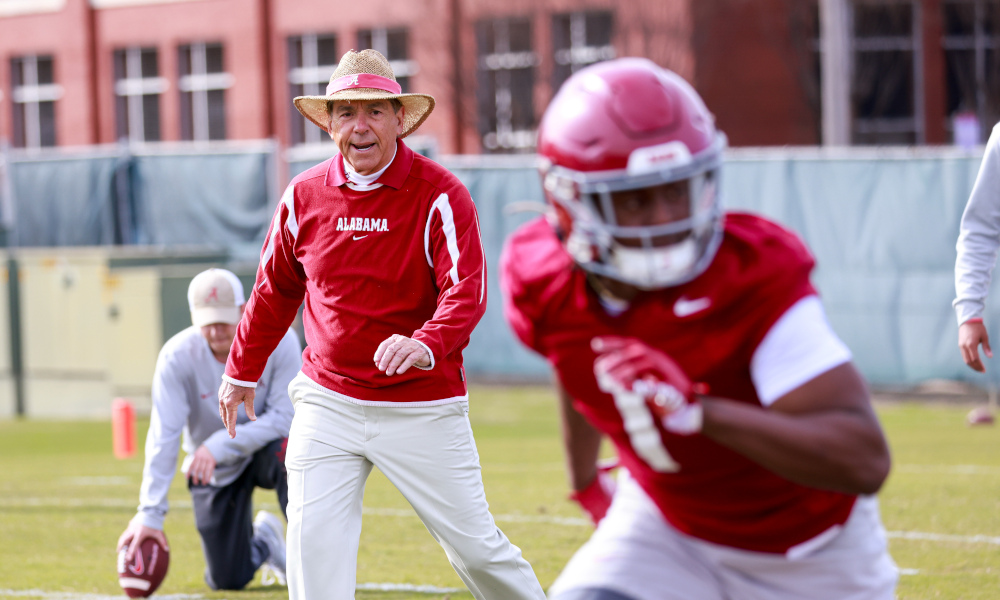 Nick Saban coaching Alabama defensive backs during first day of spring practice.