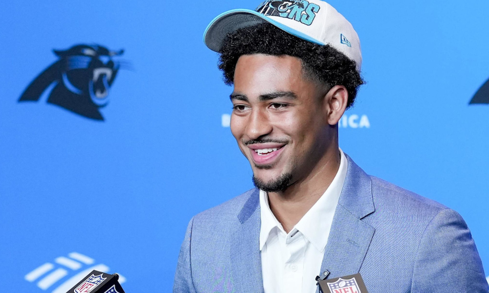 Bryce Young smiles during interviews for Carolina Panthers at the NFL Draft.
