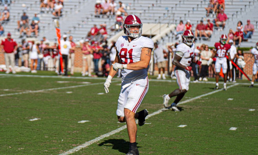 CJ Dippre runs a route in warmups ahead of A-Day